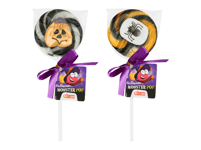 Kaksi Halloween-tikkukaramellia ruseteilla, toisessa kurpitsa ja toisessa hämähäkki.