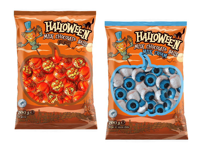 Kaksi pussia Halloween-maitosuklaapalloja kaakao- ja maitokreemitäytteellä.