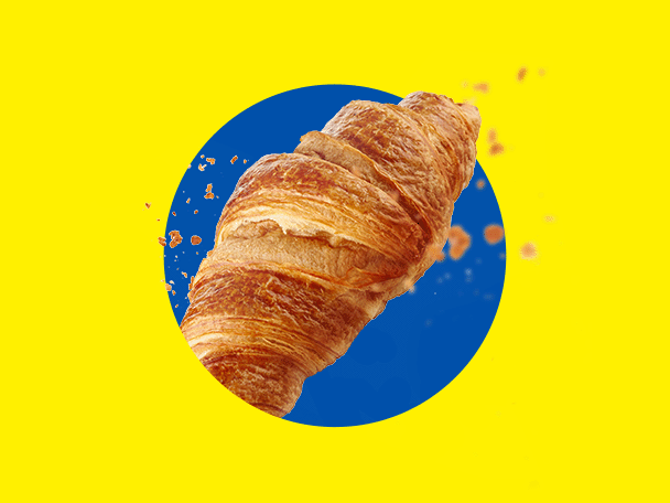 Kultainen, rapea croissant keltaisella taustalla sinisellä ympyrällä.