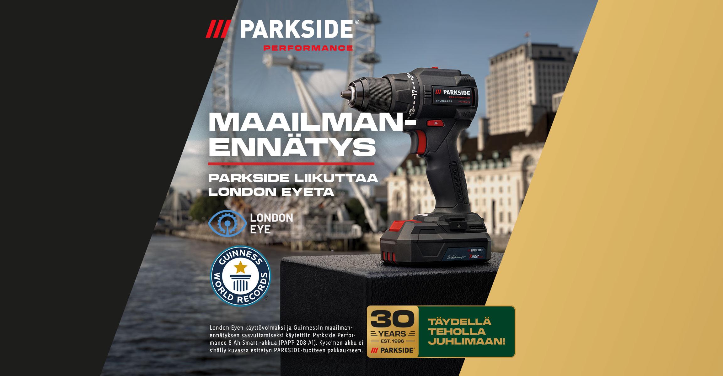 Porakone Guinnessin maailmanennätyslogolla ja London Eye -taustalla, juhlistamassa 30 vuotta.