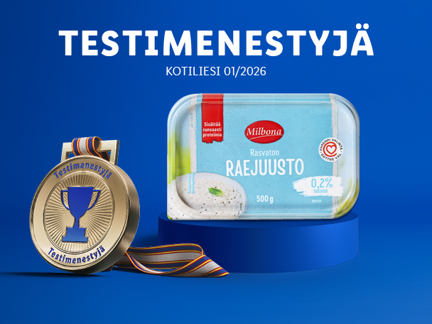Raejuusto-pakkaus ja kultainen mitali, jossa lukee 'Testimenestyjä'.