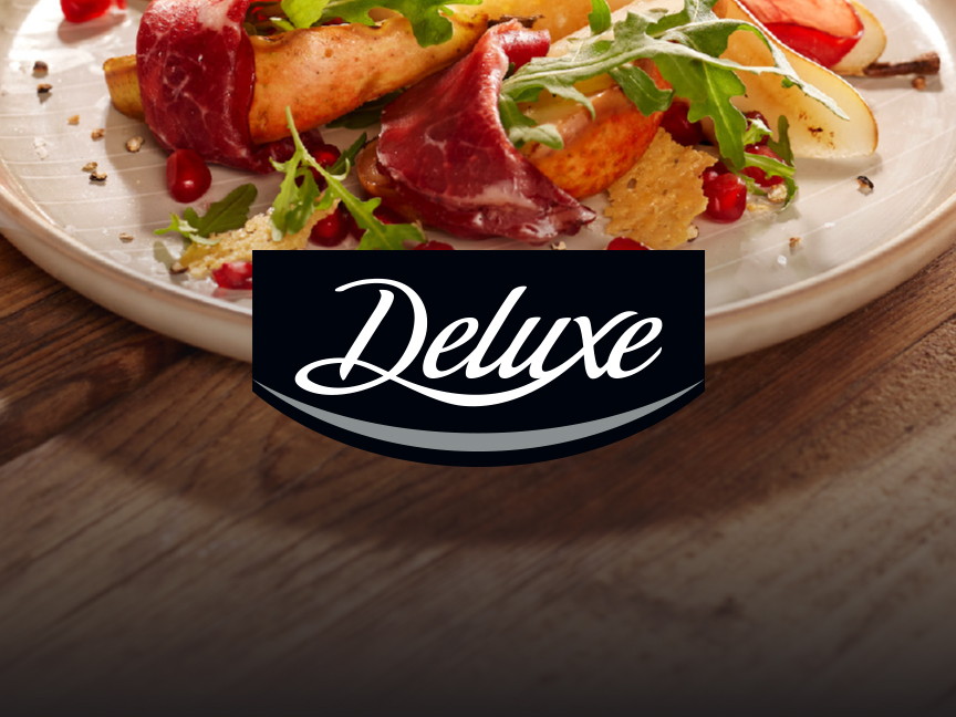 Deluxe-tuotemerkin herkullinen päärynä- ja lihasalaatti.