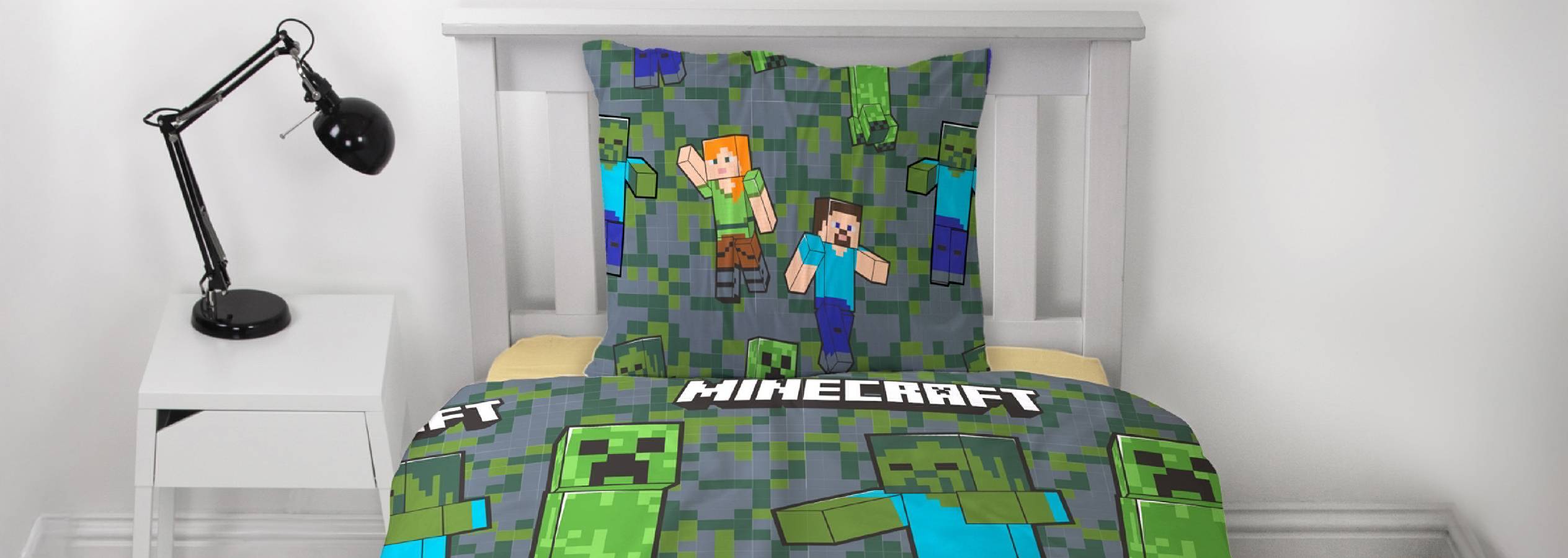 Minecraft-teemainen lasten vuodevaatesetti, jossa peitto ja tyynyliina.